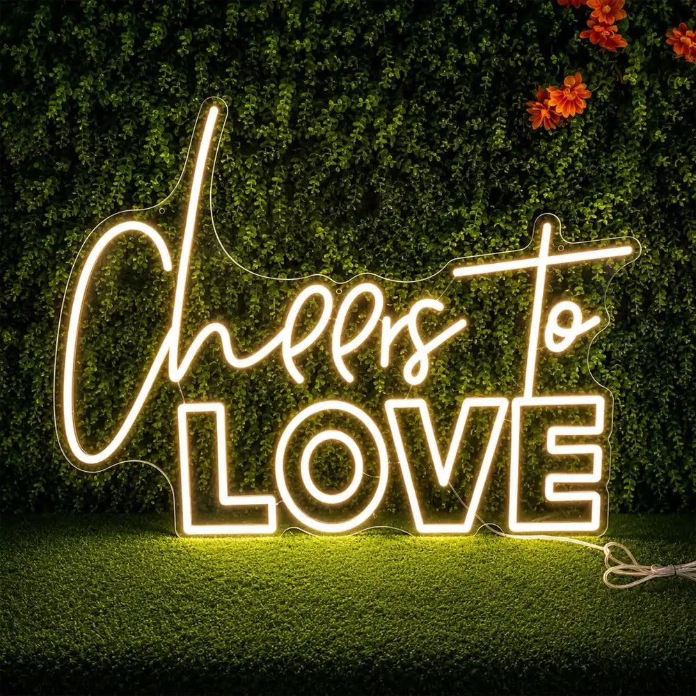 Neonskilt Cheers to Love i et bryllup